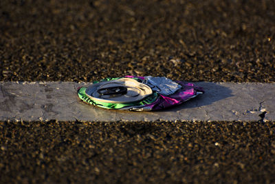 High angle view of abandoned shoes on street