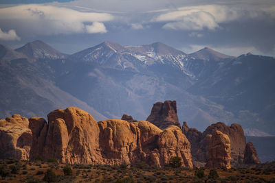 Panoramic view of rocks and mountains against sky