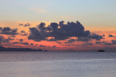 Scenic view of sea against romantic sky during sunset