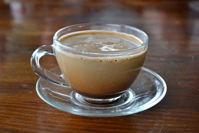 Close-up of coffee cup on table