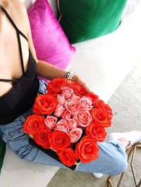 High angle view of woman holding bouquet