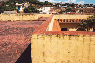 Houses against blue sky in town