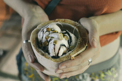 Close-up of man holding ice cream