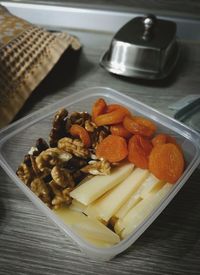 High angle view of fruits in plate on table