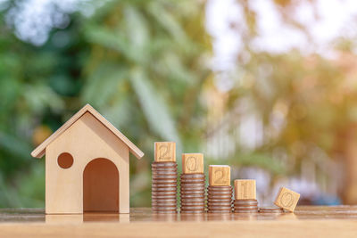 Close-up of small toy on wooden table