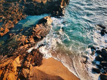 High angle view of rocks on beach