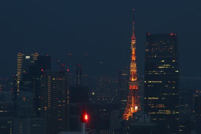 Buildings in city at night