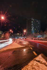 Light trails on road at night