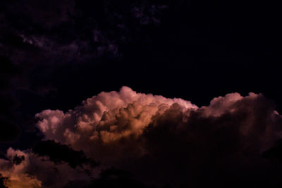 Low angle view of clouds in sky at night