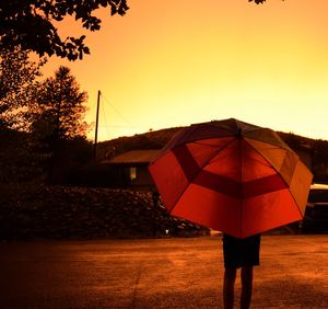 View of umbrella at sunset