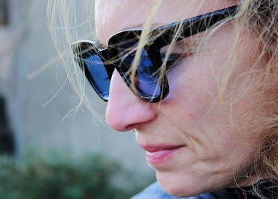 Close-up of woman wearing sunglasses