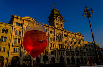Low angle view of historical building against blue sky