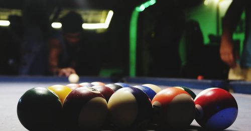 Close-up of multi colored balls on table