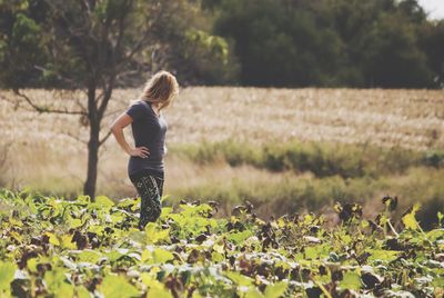 Woman standing on field