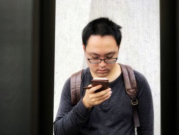 Young woman using mobile phone