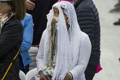 Woman wearing mask outdoors