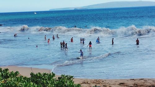 People enjoying at beach