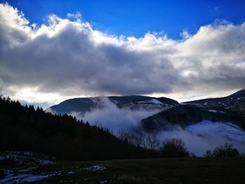 Scenic view of mountains against sky