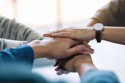 Close-up of man holding hands