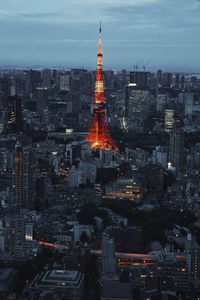 Aerial view of illuminated buildings in city