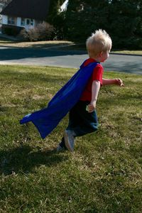 Full length of boy on field