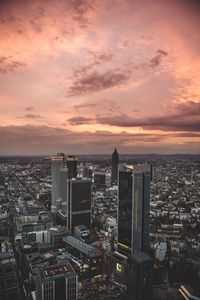 High angle view of city at sunset