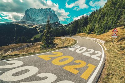 Text on road against sky