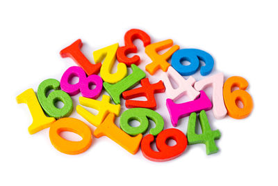 Close-up of toys over white background