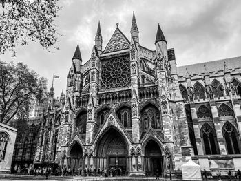 Low angle view of cathedral against cloudy sky