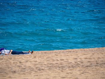 Man relaxing on beach