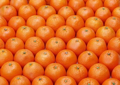 Full frame shot of oranges in market