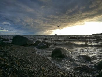 Scenic view of sea against sky during sunset