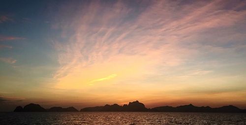 Scenic view of sea at sunset