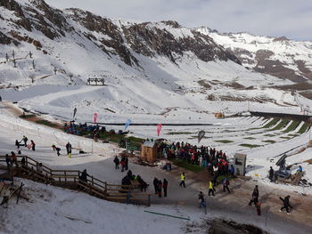 People on snowcapped mountain