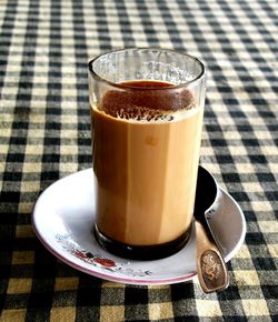 Close-up of coffee cup on table