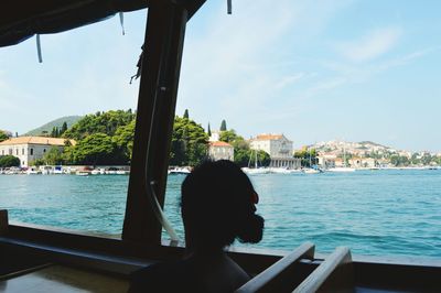 Rear view of man looking at sea