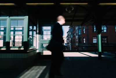 Woman standing in city