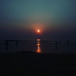 Silhouette of beach at sunset