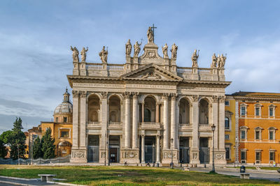 Facade of historic building against sky