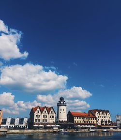 Low angle view of buildings in city against sky
