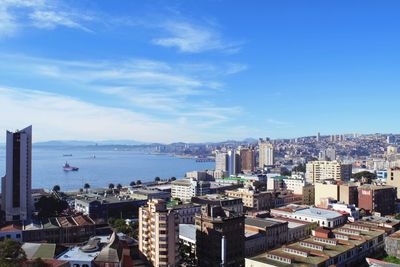 High angle view of buildings in city against sky