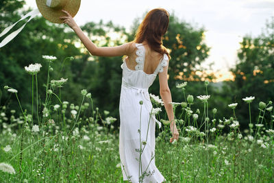 Woman standing on field