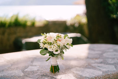 Close-up of flower vase on table