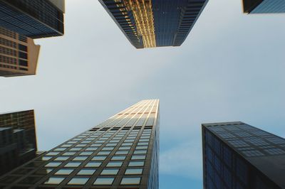 Low angle view of modern buildings against sky