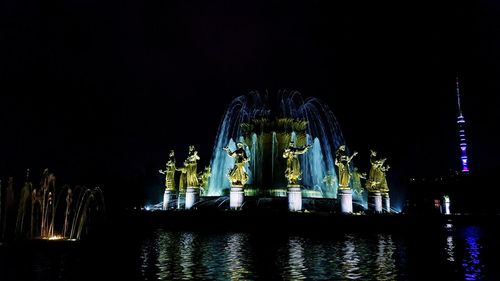 Panoramic view of illuminated buildings at night