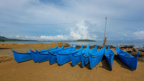 Blue fiberglass-reinforced plastic fishing boats