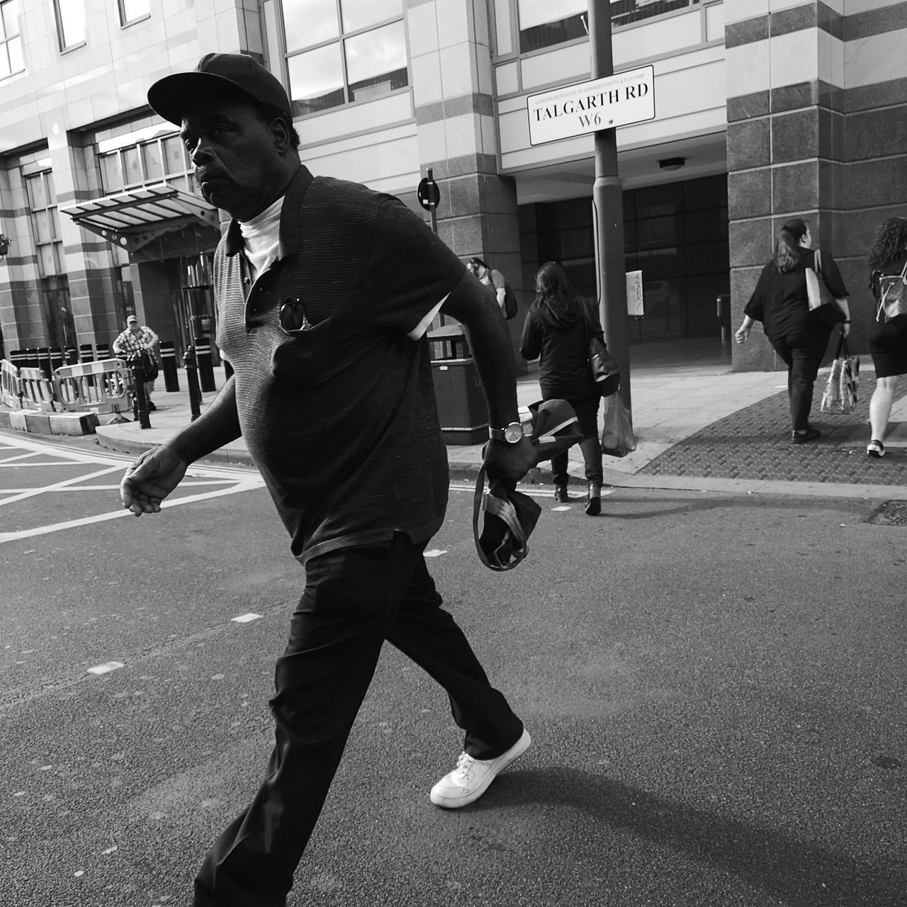 PEOPLE WALKING ON ROAD