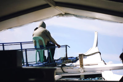 Silhouette of woman against sky