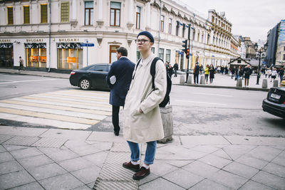 Full length of woman standing in city