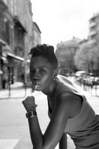 Woman standing in city